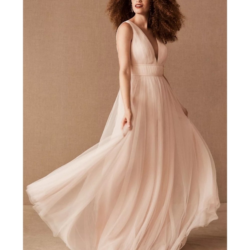 Jenny Yoo Sarita blush pink tulle gown with a plunging illusion v-neckline